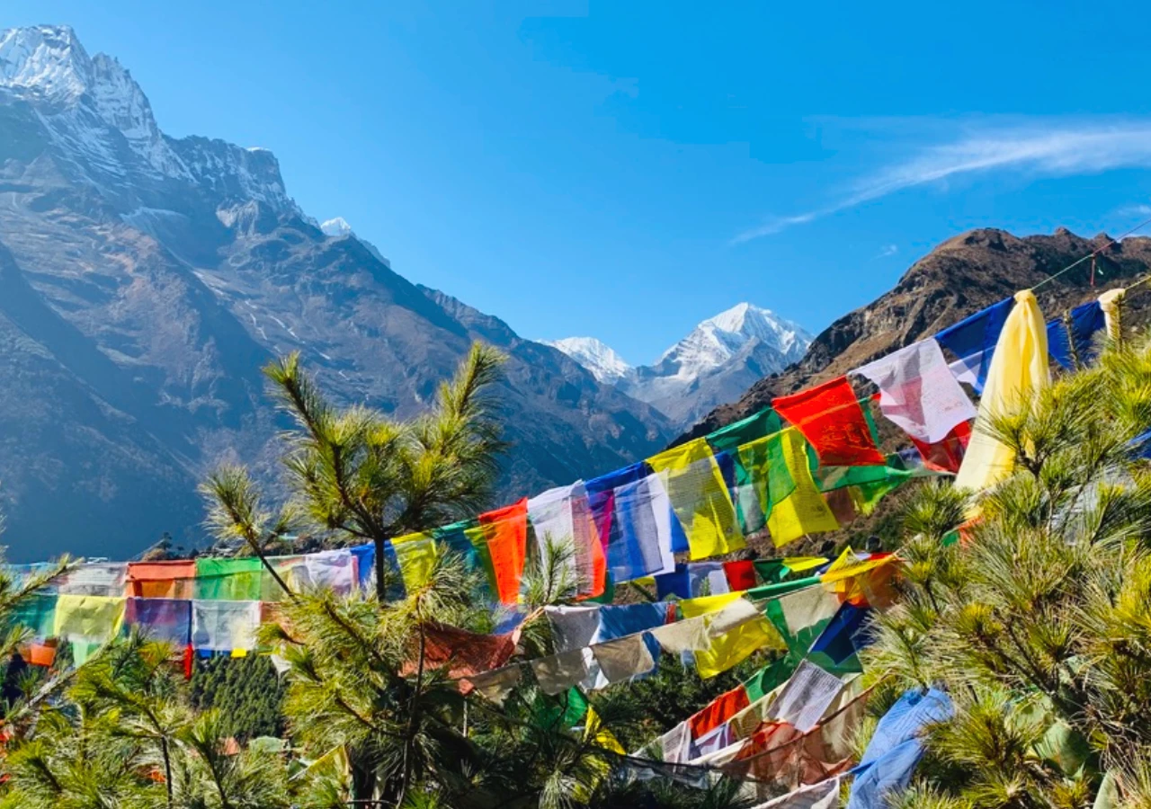 Everest three passes trekking trail and mountain view with prayer flags nepal