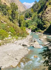 Langtang Valley Trek trail alongside the Langtang river with Himalayan mountain views in Nepal