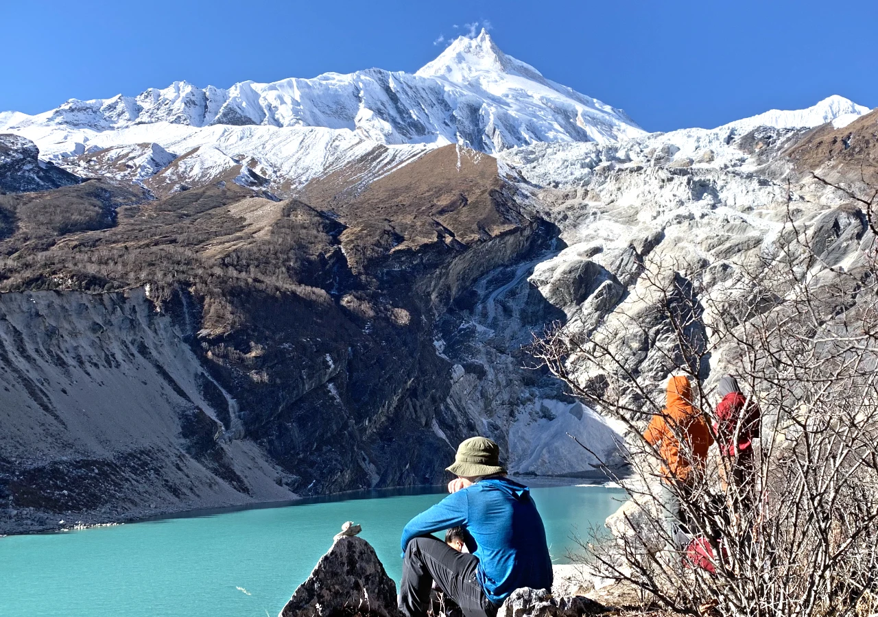 Manaslu Circuit Trek trail with Mount Manaslu and Birendra Lake Nepal
