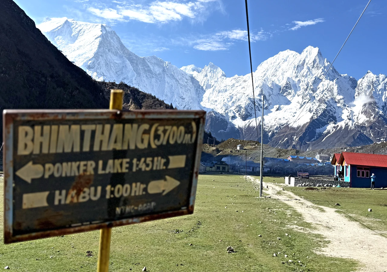 Manaslu Circuit Trek tail and Bhimtang Village with Mountain in the background