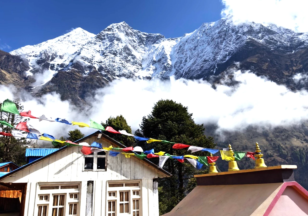 Manaslu Circuit with Tsum Valley Trekking with prayer flags and Himalayas