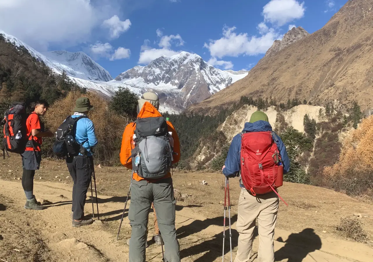 Trekkers hiking on Tsum Valley Trek with beautiful himalayan scenery