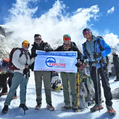 Gokyo Chola Pass EBC Trek with Chola Pass top and trekking group of Explore Vision Nepal enjoying the mountain view