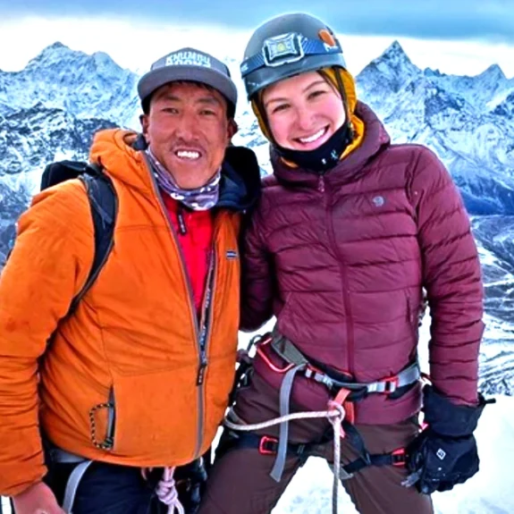 Panoramic island peak summit with climbers cherish the moment of success