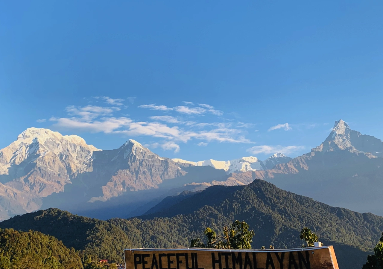 Beautiful day during Poonhill Annapurna View Trek, blue sky and spectacular Himalayan view from Australian Camp