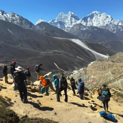 feature image of 5 best treks in nepal with everest base camp trekking trail and trekkers enjoying the view