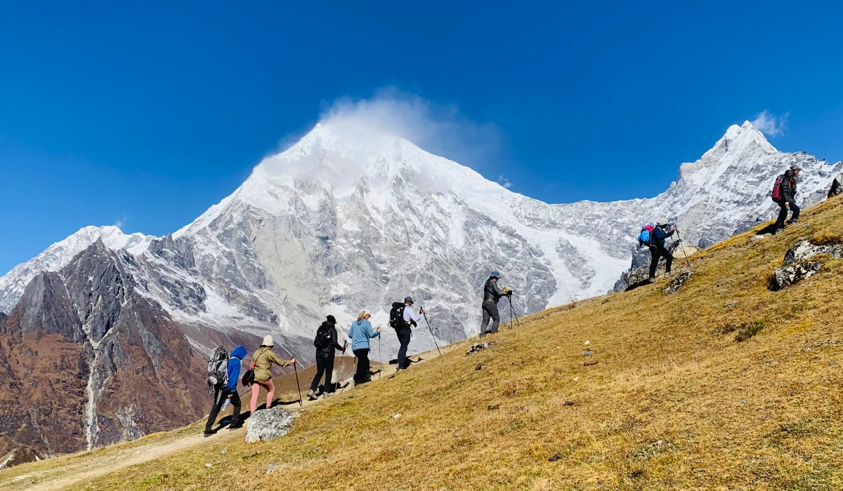 Langtang valley trekking trail and trekkers enjoying the hiking with langtang himalayan scenery 