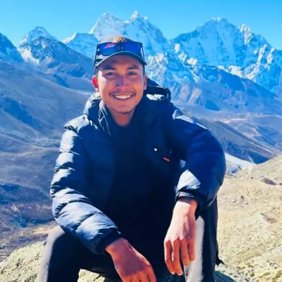 Explore Vision Nepal's guide Milan enjoying the time during everest base camp trekking route nepal