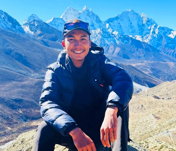 Explore Vision Nepal's guide Milan enjoying the time during everest base camp trekking route nepal