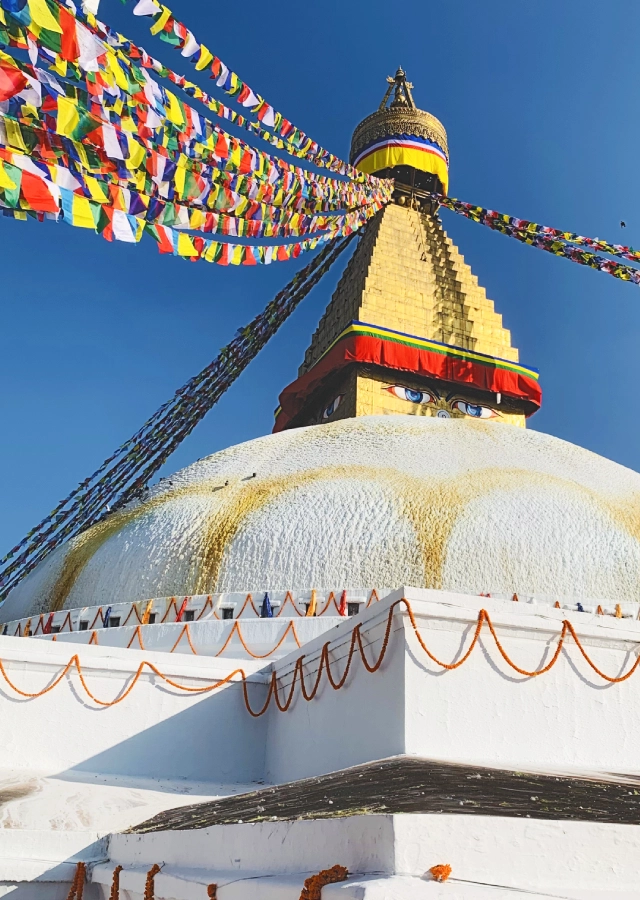 Boudhanath Stupa and Bhuddhist pilgrims in Kathmandu Nepal