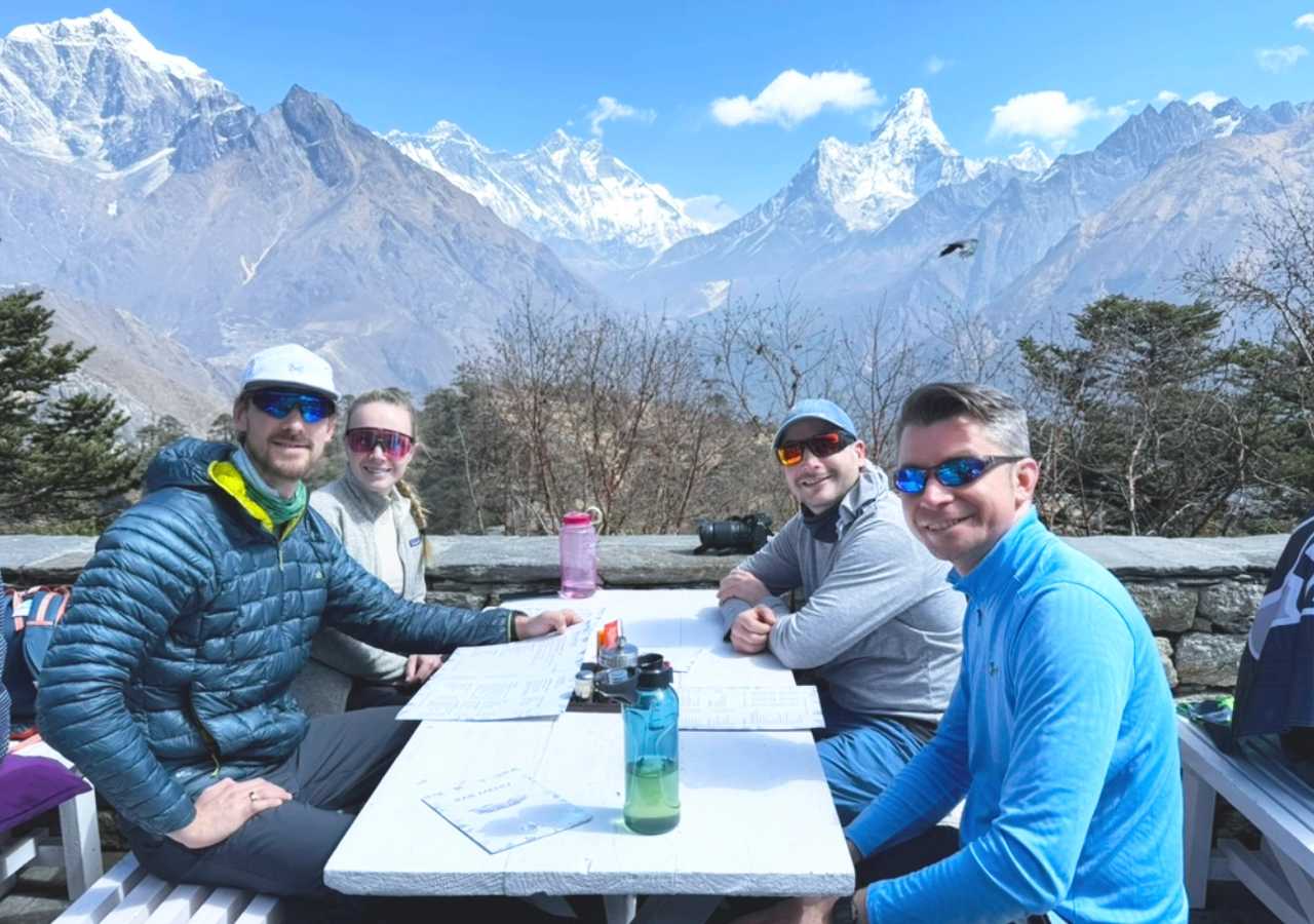 Everest base camp helicopter tour and people enjoying the Mount Everest view from famous hotel Everest view