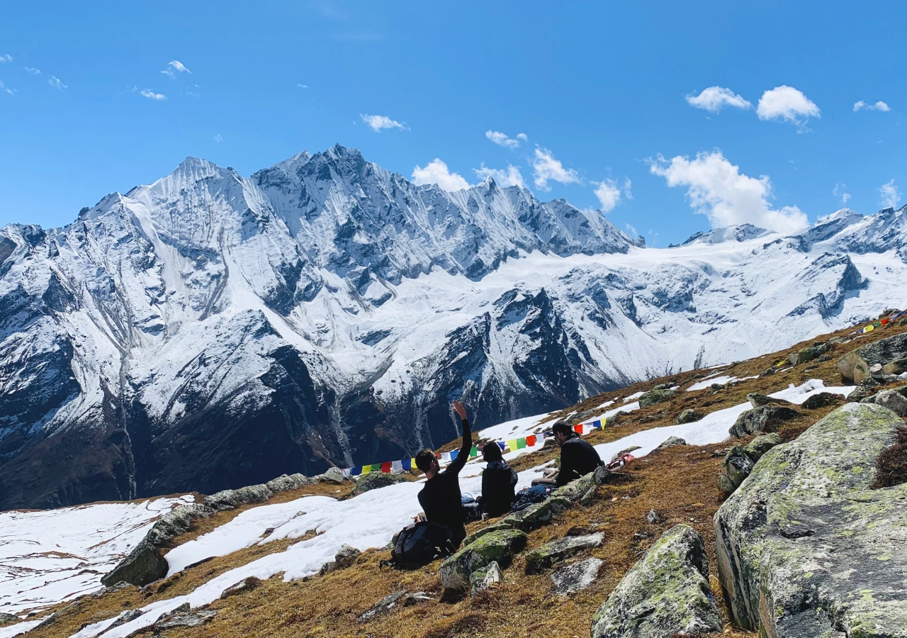 View of Langtang Lirung and Himalayas and trekkers enjoying it on the Short Langtang Valley Trek route