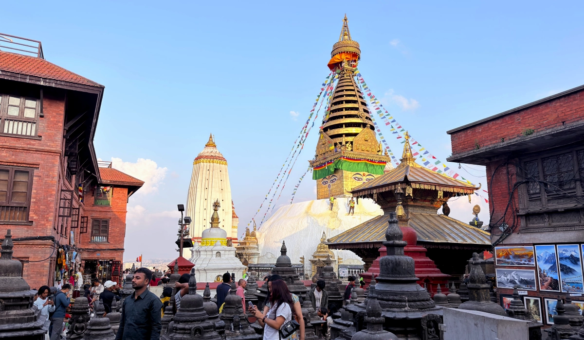 Buddhist shrines, monuments and main Swayambhunath stupa at the top hill of Kathmandu