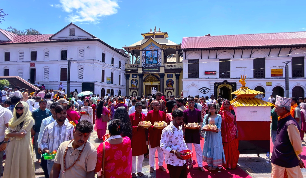 Hindu pilgrims from around the world performs sacred Abhishekam puja at Pashupatinath Temple in Kathmandu 