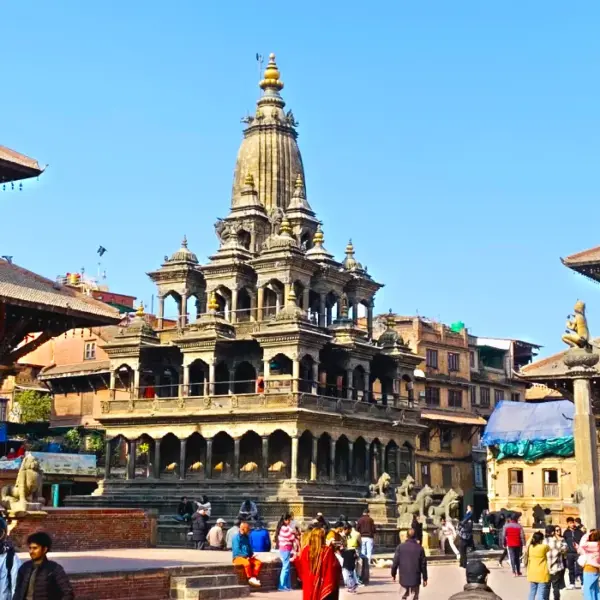 Panoramic view of Patan Durbar Square Nepal showcasing ancient temples, royal courtyards and visitors exploring this historical place