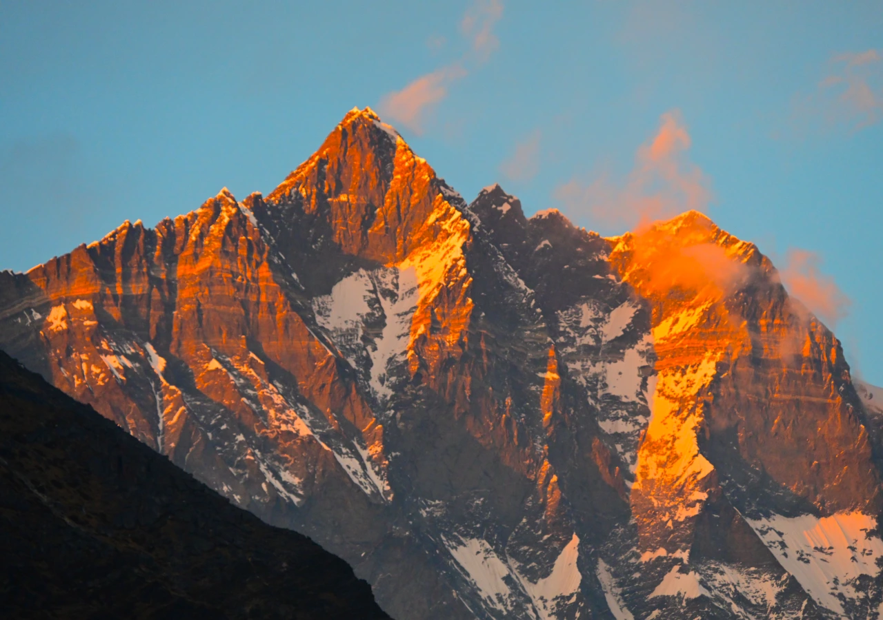 Golden sunset over Mount Lhotse during the Everest Base Camp Heli Trekking in Nepal