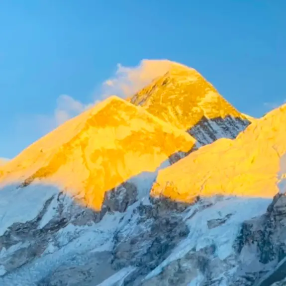 Golden sunset over Everest and the Himalayan range from Kala Patthar during Luxury Everest Base Camp Trekking in Nepal