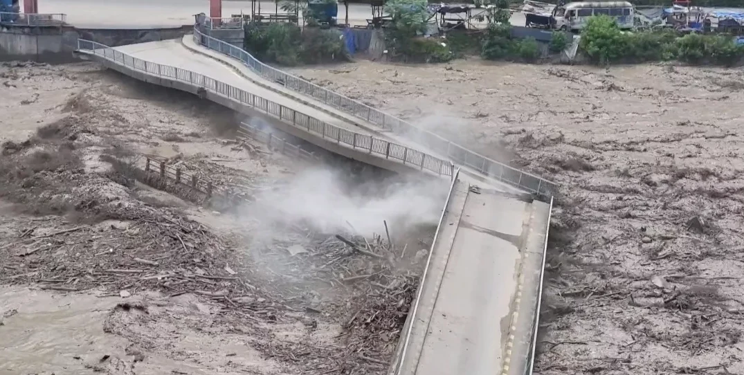 Motorable bridge to Dhading, Nepal collapsed over the Trishuli River during the Nepal flash flood
