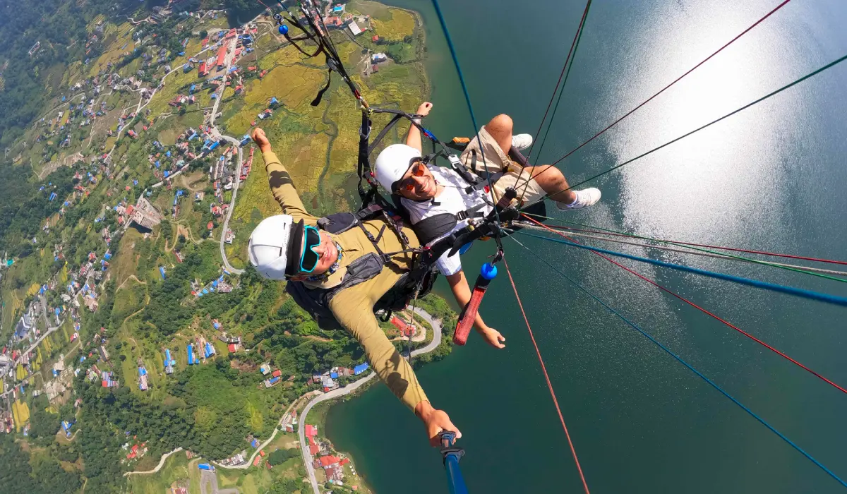 Paragliding over Pokhara with Phewa Lake and Himalayan mountain views