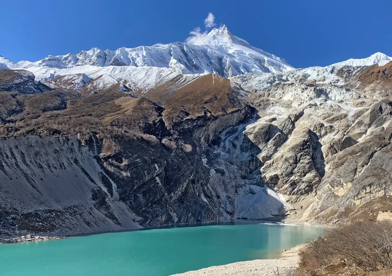 Mount Manaslu view above Birendra Lake on the Manaslu Base Camp Larke Pass Trek